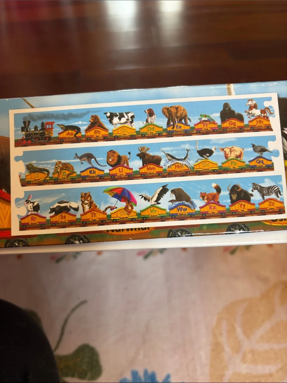 Melissa & Doug Alphabet Train Puzzle - Blue Background with Red Accents